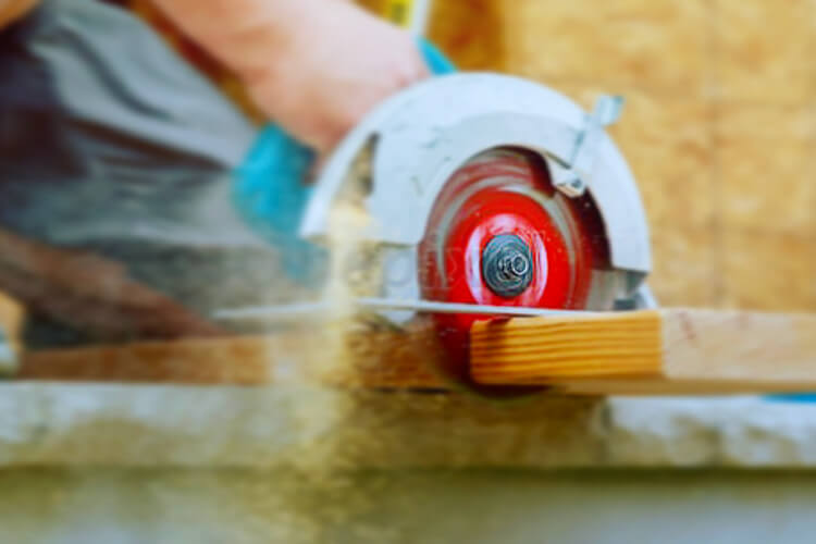 Circular saw cutting wood