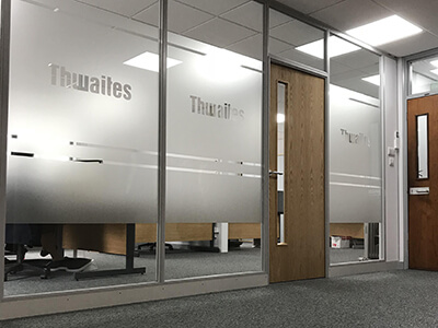 Office with frosted glass partition